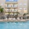 a swimming pool in front of a building