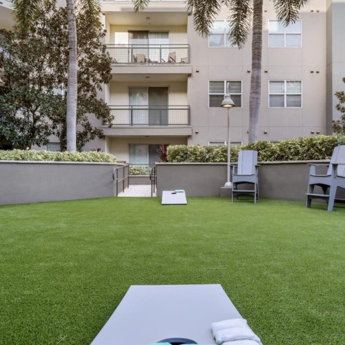 Access to resident-only features a lawn with chairs and a table
