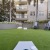 a lawn with chairs and a table