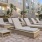 a patio with chairs and tables