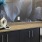 a kitchen with a vase of flowers