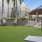 a lawn with a table and chairs