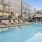 a swimming pool in front of a building
