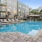 a swimming pool in front of a building