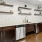 a kitchen with wooden cabinets
